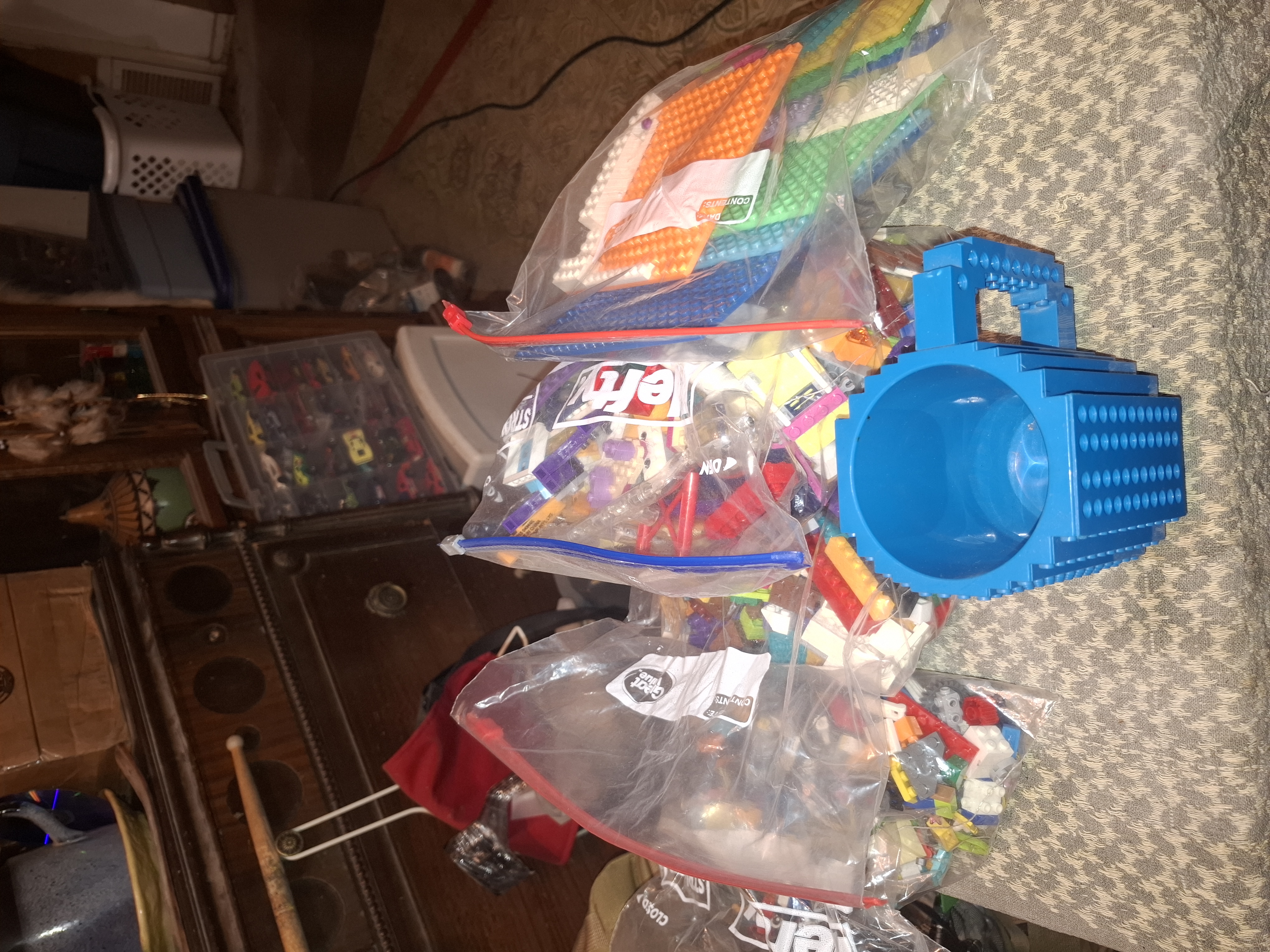 Legos x 4bags and a Lego cup photo 1